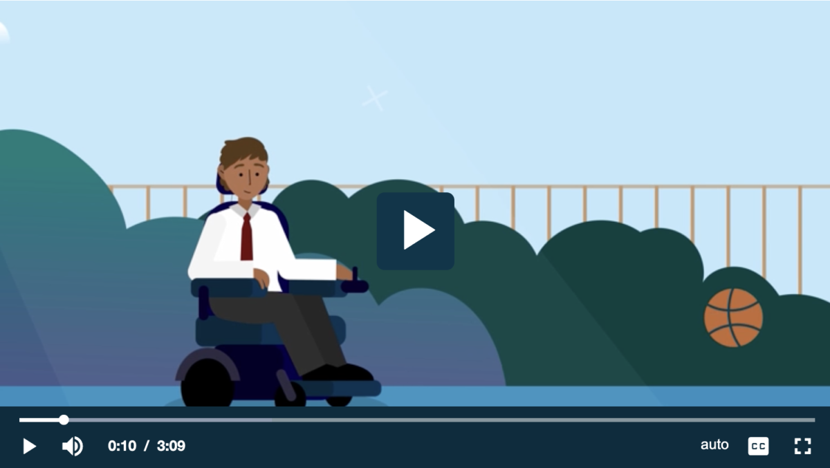 Still from an animated video with the play button in the middle. A boy in a school uniform moving along a pathway using a power wheelchair in front of a fenced yard. The boy has short black hair and brown skin.