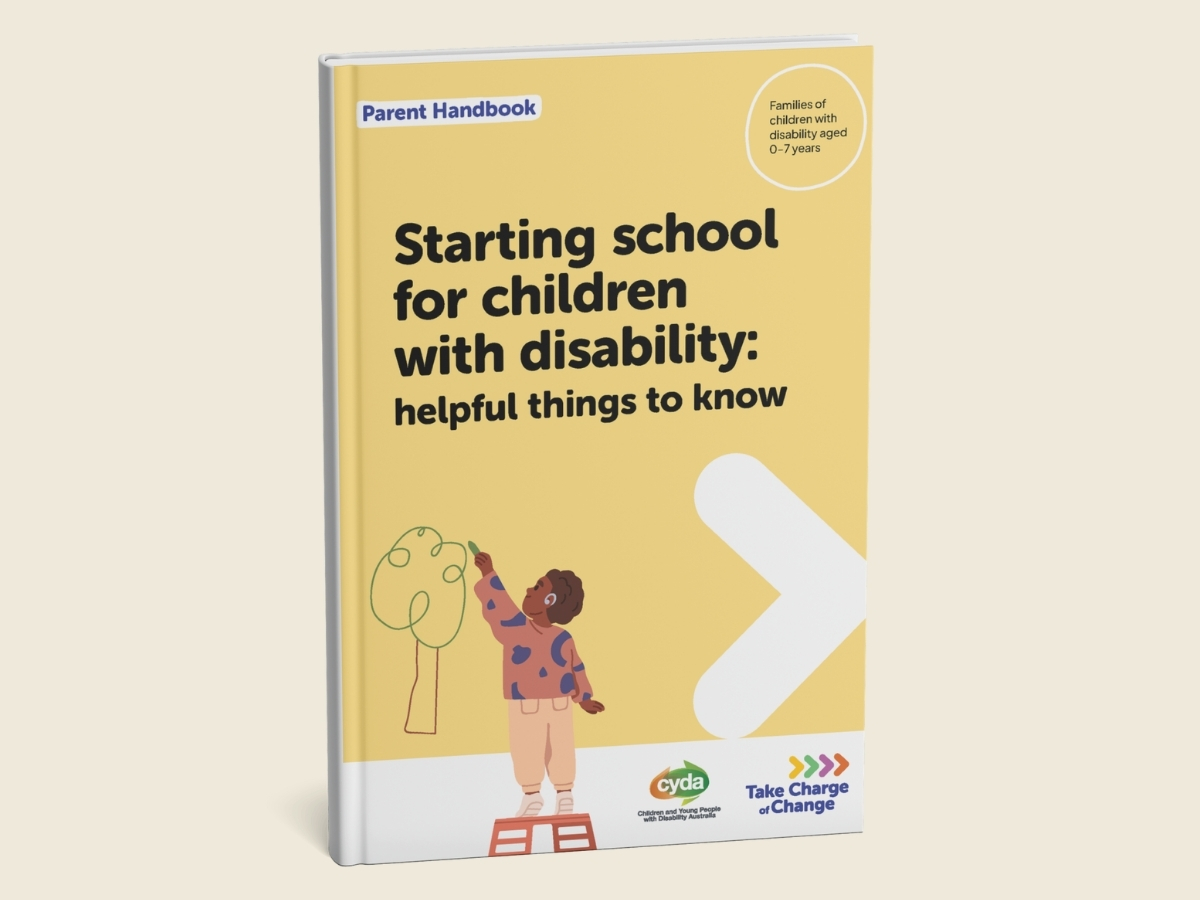 A yellow booklet featuring a child standing on a step stool, drawing a picture of a tree. The child is dark skinned with a short, brown afro. They are wearing a hearing aid, beige pants and an orange jumper with blue shapes on it. Beside them is a big white arrow pointing right. Below are the logos for CYDA and Take Charge of Change. Text reads: Parent Booklet. Families of children with disability aged 0–7 years. Starting school for children with disability: helpful things to know.